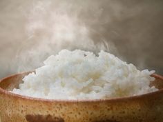 rice in a bowl with steam rising from it