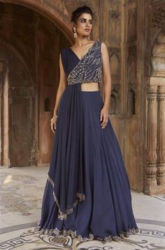 Sahara Navy Blue Embroidered Lehenga Set Embellished Blue Palazzo Set For Reception, Embellished Blue Anarkali Pre-draped Saree, Traditional Side Open Lehenga For Receptions, Western Choli Design, Indo Western Party Wear Women, Traditional Gowns Indian, Blue Indo Western Dress, Party Wear Indowestern Dresses, Drape Dupatta