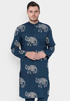 Cotton Kurta in Indigo Blue.This Readymade attire is Enhanced with Fancy Buttons, Pockets and Hand Block Elephant Print. Crafted in Chinese Collar Neck and Full Sleeve. Do note: Bottom and Footwear shown in the image is for presentation purposes only. Half to one inch may vary in measurement. (Slight variation in actual color vs. image is possible) We sell all kinds of menswear. Mens Kurta | Mens Kurta Pajama | Mens Sherwani | Mens Sherwani Sets | Traditional Menswear | Partywear Menswear | Indi Blue Casual Straight Kurta, Blue Casual Kurta For Festive Occasions, Casual Blue Kurta For Festive Occasions, Blue Casual Festive Kurta, Blue Festive Casual Kurta, Casual Blue Festive Kurta, Blue Printed Straight Kurta, Blue Cotton Straight Kurta Tops, Casual Blue Printed Kurta