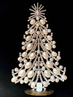 a christmas tree made out of pearls and crystals