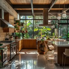 Mid-century modern kitchen connected to nature with indoor plants, natural materials, and elements maximizing views and natural light Barn House Kitchen, Kitchen Guide, Modern Kitchen Ideas, Mid Century Modern Kitchen, Mid Century Kitchen, Mid Century Modern House, Mid Century House, Dream House Decor