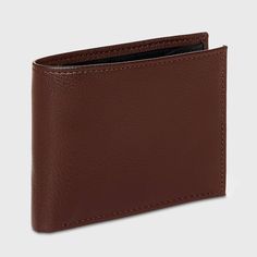 Bring convenience to carrying your money and cards with this Slimfold Wallet from Goodfellow & Co™. This bi-fold wallet features multiple card slots, ID pocket and a bill compartment, while the slimfold design lends it a non-bulky feel, making it easier to slip in the front or rear pockets of your trousers. Best of all, it features RFID blocking that helps prevent your cards and IDs from digital theft. Showcasing a faux-leather finish in brown, it's sure to bring classic style to your everyday a Modern Brown Wallets With Rfid Blocking, Bifold Wallets For Daily Use, Classic Wallet With Id Window For Everyday Use, Modern Brown Trifold Wallet With Rfid Blocking, Modern Wallet With Id Window For Business, Formal Trifold Wallet With Card Slots, Formal Trifold Wallet With Interior Card Slots, Classic Trifold Card Holder With Id Window, Classic Bifold Card Holder With Id Window