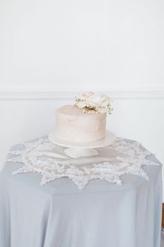 a white cake sitting on top of a table