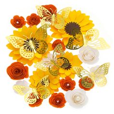 yellow and orange paper flowers with butterflies on them