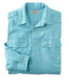 Our popular Sunwashed Men’s Canvas Shirt feels broken-in right from the start and only gets better with age. Traditional Fit: Relaxed through the chest, sleeve and waist. 100% cotton canvas. Prewashed to soften fabric and prevent shrinking. Machine wash and dry. Spread collar. Button-flap patch pockets. Back box pleat lets you move freely. Shirttail hem. Rugged buttons are carefully stitched to stay put. Seams have durable double-needle stitching. Imported. | Men's Sunwashed Canvas Shirt, Tradit Sea Blue, Men's Shirts, Mens Clothing, Ll Bean, Wrist Watches, L L Bean, Casual Button Down Shirts, Denim Button Up, Cotton Canvas