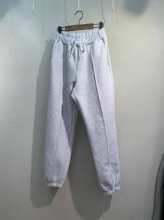 "Women's Woolen Fleece Sweatpants with relaxed fit Size One size, good for US size 4-12 Waist width 32cm Length 93cm inseam 66cm /26\" Fabric and Care Woolen fleece cotton 100% Machine washable and tumble dry Made in S Korea" Winter Full-length Pants With Ribbed Waistband, Solid Color Sportswear Sweats With Pockets, Baggy Solid Sweats For Winter, Winter Baggy Solid Color Sweats, Winter Baggy Solid Sweats, Baggy Solid Color Winter Sweats, Comfy Relaxed Fit Pants With Pockets, Comfy Joggers With Side Pockets For Fall, Fleece Pants With Comfort Waistband For Jogging