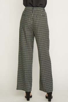 Elevate your style with our Olive Plaid Trousers! These high waisted, wide leg pants feature a playful gingham print and functional pockets. Belt loops and a zipper front closure add convenience and the lining offers comfort for all-day wear. Amp up your work wardrobe with these fun and functional trousers. 75% Polyester 25% Rayon Casual Gingham Wide Leg Bottoms, Casual Wide Leg Gingham Bottoms, Plaid Straight Pants For Spring, Trendy Wide Leg Gingham Pants, Casual Gingham Trousers, Trendy Plaid Wide Leg Bottoms, Spring Plaid Wide Leg Pants, Casual Plaid Wide-leg Bottoms, Chic Plaid Straight Leg Bottoms