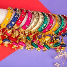 Elevate your style with our exquisite Indian Silk Thread Bangles. Expertly handcrafted with luxurious silk thread and adorned with stunning Kundan bangles, these ethnic bracelets add a touch of elegance to any outfit. Perfect for Indian weddings, these assorted Kangan with Latkan are the epitome of fashion and luxury. Free size for a comfortable fit. Material: Plastic, Silk Thread and Kundan Size: Designed as free size, these bangles offer versatility and ease of wear for women of different wris Rakhi Greetings, Bangle Ceremony, Holi Gift, Kundan Bangles, Henna Cones, Ear Chain, Silk Thread Bangles, Thread Bangles, Bangle Bracelet Set