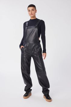 The utilitarian jumpsuit is elevated in soft, supple lambskin leather with adjustable antique nickel fasteners, fitted bodice and relaxed, straight leg. 100% lambskin leather Made in India Concealed side zip closure Planet first packaging: items are shipped in home compostable or recyclable mailers Cap Rising, Leather Overalls, Leather Cleaning, Back Strap, Lambskin Leather, Fitted Bodice, Leather Working, Side Zip, Fitness Fashion