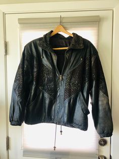 This authentic vintage Winlit black leather jacket is in great shape. It is a size medium. Please see the photos for details.  We disclose as much as we know about an item.  Our items are vintage, gently used pieces, (with the exception of a few handmade products.)  They may have flaws or wear.  Check out the pictures to ensure you know what you are buying. All products are "as is" condition.  If you are not satisfied, we may offer a full refund, less shipping to your location (if applicable) an Vintage Black Leather Outerwear, Vintage Black Leather Jacket For Fall, Vintage Black Leather Jacket For Winter, Vintage Black Leather Jacket With Long Sleeves, Vintage Black Long Sleeve Leather Jacket, Vintage Leather Jacket, Black Leather Jacket, Handmade Products, Vintage Leather