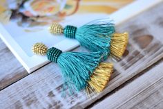 "Beaded tassel earrings are TREND! They will be a wonderful accessory for any of your style! ♡I promise that you will always be in the spotlight with these earrings!♡ More colors https://www.etsy.com/ru/shop/UkrainianJewelryShop?ref=listing-shop2-all-items-count%C2%A7ion_id%C2%A7ion_id%C2%A7ion_id§ion_id=18493990 Length: 3.6 inches (9 cm) ❤ CUSTOM ORDERS It is ABSOLUTELY HANDMADE . So if you like this item in a different color or size, send me a message please. I will send you a link for a \"cus Turquoise Tassel Earrings For Party, Party Turquoise Tassel Earrings, Handmade Turquoise Tassel Earrings For Party, Elegant Turquoise Tassel Earrings, Green Fringe Tassel Earrings For Party, Elegant Turquoise Tassel Fringe Earrings, Elegant Turquoise Tassel Earrings With Fringe, Elegant Green Tassel Earrings For Summer, Beaded Tassel Earrings