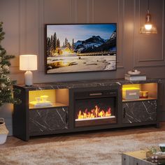 a living room with a fireplace and television on the wall, in front of a christmas tree