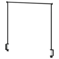 a black metal pole with two handles on each side and one handle attached to it