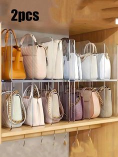 several rows of purses are on display in a store with the caption 2 pcs