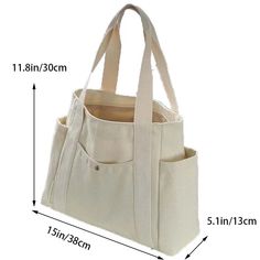 an image of a white bag with measurements for the bottom and side pockets on it