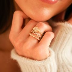 a close up of a person wearing a ring