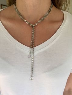 Necklines are ever-changing. Some days, boat necks are the go-to. Others, plunging is the mood. When picking a necklace as versatile as your wardrobe, lariats are the best choice. Oh, and lariats with genuine Austrian Swarovski Crystals and 40 inches of glossy chain are next-level. This necklace is available with two chain variations: My sparkle chain (the thicker option and the one featured in the modeled shots) and my t-shirt chain (also very reflective but daintier and more tattoo-style). The Double Strand Crystal Necklaces For Jewelry Making, Double Strand Crystal Necklace For Jewelry Making, Adjustable Metal Crystal Necklaces, Adjustable Metal Crystal Necklace, Handmade Jewelry Bracelets, Lariat Necklace, Tattoo Style, Aurora Borealis, The Mood