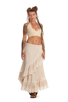 "A long wrap skirt fit for a festival goddess! Beautiful, natural jute cotton and cotton lace make up a skirt that is comfy and super fun to wear. It wraps at the waist to fit a wide range of sizes.  SIZE  ONE SIZE Waist = 28-38\" (71-96.5 cm) Length = 33\" (84 cm) THIS LISTING IS FOR CREAM Also available in Masala, Army, Black or Pink. Code: JUTE LUCY SKIRT (ROKJLWR)" Fitted Beige Skirt For Festivals, Beige Cotton Skirt With Lace Trim, Bohemian Lace Maxi Skirt For Beach, Bohemian Lace Maxi Skirt For Summer, Belly Dance Maxi Skirt For Festival, Fitted Cotton Wrap Skirt For Festivals, Festival Skirt With Lace Trim, Summer Festival Lace Skirt, Summer Beige Lace Maxi Skirt