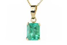 Featured here is a stunning emerald cut Colombian emerald necklace in fine 14K yellow gold. Displayed in the center is a medium-green emerald with very good clarity, accented by a simple four-prong gold mount, allowing for the emerald to be shown in full view. The earth mined, Colombian emerald has a nice green color with excellent qualities. An 18-inch gold chain will be provided with this beautiful pendant! This necklace is ideal for everyday use and is the perfect accessory to any outfit. The Green Emerald Baguette Cut Necklace, Classic Yellow Gold Emerald Cut Necklace, Luxury Emerald Cut Emerald Necklace In Yellow Gold, Classic 14k Gold Emerald Cut Emerald Necklace, Rectangular Emerald Necklace In Fine Jewelry Style, Gold Emerald Cut Emerald Necklace, Luxury 14k Gold Emerald-cut Emerald Necklace, 14k Yellow Gold Emerald-cut Emerald Necklace, 14k Gold Emerald Cut Emerald Necklace