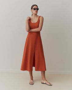 A 3-in-1 dress perfectly fitted for all of your summer activities, made from soft and breathable Pima cotton. Wear the dress on its own without the cropped top for a more sensual look, or with it as an extra layer for more coverage. The cropped top can also be worn on its own, with a summer pants or shorts to complete the look. Versatile Fitted Spring Maxi Dress, Versatile Fitted Maxi Dress, Fitted Longline Midi Dress For Summer, Versatile Fitted Summer Dresses, Beach Midi Dress With Straight Neckline, Chic Longline Midi Dress For Summer, Fitted Summer Maxi Dress With Side Slits, Elegant Cotton Dresses With Side Slits, Versatile Summer Maxi Dress