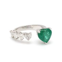 Emerald heart & diamond heart open ring gold | Natural heart shape emerald diamond ring gold | Emerald cut emerald ring | Heart diamond ring GEMSTONE DETAILS : ✦ Gemstone : Emerald ✦ Gemstone Type : Natural ✦ Gemstone Size : 8 MM ✦ Gemstone Shape : Heart ✦ Number of Gemstones : 1 ✦ Gemstone Weight : 2.01 carats ✦ Gemstone Grade : AAA DIAMOND DETAILS : ✦ Diamond Type : Natural ✦ Diamond Size : 3.80 mm ✦ Diamond Color : F-G ✦ Diamond Clarity : Slightly included ✦ Diamond Cut : Excellent - Very Goo Heart Shaped Emerald Ring, White Gold Heart Cut Emerald Ring, Heart Cut Emerald Ring With Prong Setting, Emerald Cut Emerald Ring, Heart Diamond Ring, Open Ring Gold, Diamond Ring Gold, Diamond Heart Ring, Ring Heart