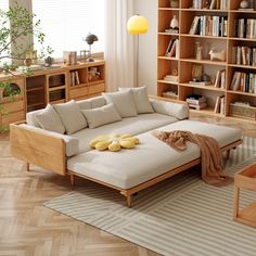 a living room filled with furniture and bookshelves