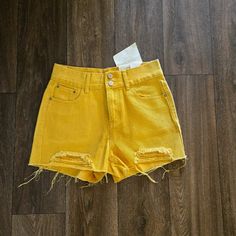 New With Tag. Trendy High Waist Yellow Jean Shorts, Trendy Yellow Shorts With Pockets, Trendy Yellow Shorts For Day Out, Yellow High-waisted Jean Shorts For Summer, Yellow High Waist Jean Shorts For Summer, High Rise Yellow Cotton Shorts, Trendy High Waist Yellow Shorts, High Waist Yellow Jean Shorts For Spring, Trendy Yellow Cotton Shorts