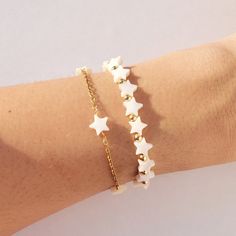 Pearl bracelet Star bracelet Stacking Bracelet Pearl Beaded - Etsy Brasil Dainty White Bangle Charm Bracelet, Dainty Star-shaped Bracelets For Gifts, Dainty Bracelets With Star Charm For Gift, Dainty Bracelets With Star Charm As Gift, Dainty Star-shaped Bracelet For Gift, Dainty Star Bracelet For Gifts, Dainty Hypoallergenic White Rosary Bracelet, White Star-shaped Adjustable Beaded Bracelets, Star Charm Bracelets As Gift