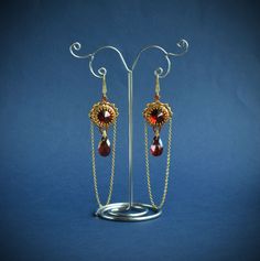 Game of thrones jewelry crystal earrings beadwork jewelry beaded earrings Game Of Thrones Jewelry, Game Of Thrones Gifts, Beautiful Beaded Earring, Long Dangle Earrings, Bead Work Jewelry, Red Bead, Birthday Gifts For Women, Red And Gold, Metal Beads