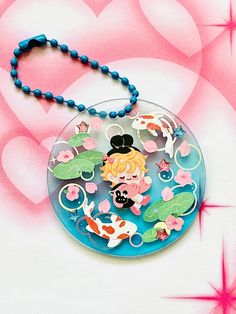 a necklace with a cartoon character on it