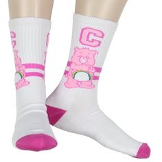 Step up your sock game with these adorable Care Bears Crew Socks featuring the ever-joyful Cheer Bear! These crew socks are made from a soft and breathable cotton blend and provide all-day comfort and style. The standout Cheer Bear design, with its iconic rainbow belly badge and cheerful expression, adds a touch of nostalgia and whimsy to your wardrobe. The pink varsity stripe detail on the ribbed cuff enhances the playful vibe, making these socks perfect for showing off your love for Care Bears Preppy Socks, Care Bears Cheer Bear, Cheerful Expression, Cheer Bear, Sock Game, Socks For Men, Room Idea, Bear Design, Care Bears