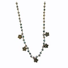 This dainty flower crystal necklace is made with a mystic green crystal with ab coating. It is accented with antique gold daisy flowers. Available in assorted sizes. Closure is lobster clasp  Comes boxed. Cottagecore Accessories, Flower Crystal, Jewel Necklace, Daisy Flowers, Funky Jewelry, Trendy Necklaces, Green Crystal, Crystal Flower, Bead Jewellery