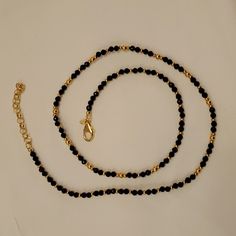 Beautiful Black And Gold 24" Necklace By Bellezza. In Preowned But Unworn Condition, So Nwot (New Without Tags). Made In Italy (Itaor). Faceted Black Spinel Beads With Gold Beads Shimmer! Lobster Claw Clasp. Measures 24" Plus 2.5" Extender. Elegant Black Necklace With Gold Beads, Elegant Black Beads With Gold Details, Elegant Black Necklaces With Gold Beads, Black Beaded Necklace With Gold Beads For Party, Black Single Strand Beaded Necklaces For Party, Black Single Strand Beaded Necklace For Party, Party Black Single Strand Beaded Necklace, Adjustable Black Necklace With Gold Beads, Elegant Black Beaded Chain