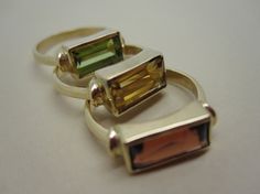 Rectangular Peridot Stack Ring in 14K Yellow Gold by Studio1040, $475.00 Rectangular Yellow Gold Ring With Gemstone, Green Rectangular Rings With Bezel Setting, Gold Rectangular Rings With Accent Stones, Green Rectangular Bezel Set Ring, Rectangular Gold Rings With Accent Stones, Formal Rectangular Birthstone Ring, Modern Rectangular Rings With Accent Stones, Fine Jewelry Rectangular Faceted Ring, Rectangular Faceted Fine Jewelry Ring