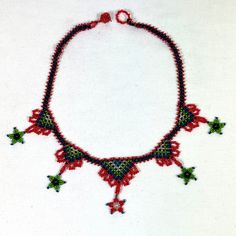 Seed bead woven dangle choker necklace -New handmade -approximately 16" long  -star dangle center front is approximately 2" long -ball and loop closure Thanks! Woven Necklace, Necklace Red, Boho Green, Handcrafted Artisan Jewelry, Red Blue Green, Bead Weaving, Seed Bead, Artisan Jewelry, Seed Beads