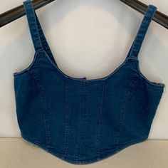 Nwt Derek Heart Blue Jean Crop Top 72% Cotton 26% Polyester And 2% Spandex. Front V And Zippered Back And Shorter In The Back. Size M Blue Fitted Elastane Crop Top, Fitted Blue Elastane Crop Top, Blue Fitted Stretchy Crop Top, Blue Cropped Elastane Crop Top, Fitted Blue Denim Top, Jean Crop Top, Crop Top With Jeans, Blue Jean, Cropped Jeans