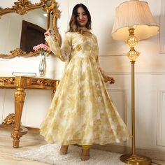 Light Yellow colored anarkali suit is prettified with floral printed work as shown which makes it appear classy. This top is made of georgette fabric which is accompanied with crepe bottom, inner and printed georgette dupatta. Women can buy this suit to wear for their parties and functions. Note:- The actual product may differ slightly in color and design from the one illustrated in the images when compared with computer or mobile screen. Size Chart Size: Semi Stitched/Unstitched can be altered Georgette Dress With Digital Print For Designer Wear, Elegant Georgette Sets With Floral Print, Fitted Georgette Anarkali Set With Digital Print, Floral Print Georgette Anarkali Set For Party, Floral Print Georgette Salwar Kameez For Party, Floral Print Georgette Maxi Sets, Floral Georgette Anarkali Set For Party, Georgette Maxi Sets With Floral Print, Elegant Semi-stitched Anarkali Set With Floral Print