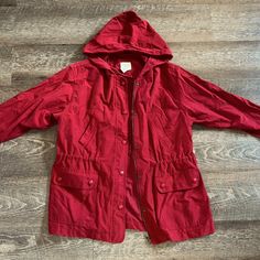 Never Worn! Heavy Duty Rain Jacket, Runs A Little Large. Red Hooded Outerwear With Pockets, Red Parka With Pockets For Fall, Casual Red Parka With Pockets, Casual Red Outerwear For Cold Weather, Red Long Sleeve Windbreaker For Cold Weather, Red Hooded Outerwear For Fall, Casual Red Outerwear For Outdoor, Red Spring Outerwear With Pockets, Red Cotton Outerwear For Spring