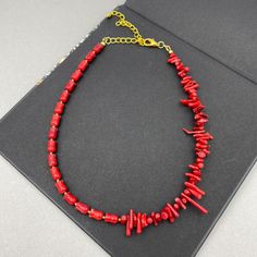 This striking Red Coral choker layering necklace features bold, vibrant beads that add a pop of color to any look. Designed to be worn alone for a statement piece or layered with other necklaces for a dynamic effect, this necklace brings a touch of coastal elegance to both casual and formal attire. Necklace length is 15" long plus additional 4 inch extender chain. - non tarnish gold plated finding - clasp is gold plated stainless steel lobster claw - 4 inches extender is non tarnish gold plated Trendy Red Choker As Gift, Trendy Red Round Bead Necklaces, Trendy Red Necklaces With Round Beads, Trendy Red Round Beads Necklace, Trendy Red Necklace With Colorful Beads, Trendy Red Beaded Chain Jewelry, Trendy Red Necklaces With Colorful Beads, Trendy Red Beads For Gifts, Trendy Red Beaded Necklaces