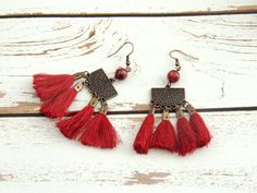 "Oid Red Vintage Ethnic Hanging earrings Beautiful Tassel, Beads & stones Earrings. Made from metal and lovely beads and Long Tassel in different colors and shapes. It is good for wedding party, any other special occasion and also for daily life. Beautiful handmade art with loops material and threading beads, all these creates an impressive and spectacular colorful earring. Excellent quality materials. Size: 2.5\"/1\". * Handmade * Lovely Design * light weight * Excellent quality * Complimen Adjustable Bohemian Tassel Earrings With Latkans, Red Bohemian Tassel Earrings As Gift, Red Bohemian Beaded Earrings With Tassels, Bohemian Red Beaded Earrings With Tassels, Red Tassel Earrings With Latkans As Gift, Red Tassel Earrings With Latkans For Gifts, Red Latkans Tassel Earrings For Gifts, Adjustable Red Bohemian Tassel Earrings, Traditional Red Tassel Earrings For Festival