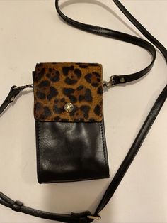 Patricia Nash Brown Leopard Crossbody Bag Leather phone purse New. Condition is "New without tags". Shipped with USPS Priority Mail. fits a phone, mask, lipstick and money.  All you need. Super cute and nicely made.  I just have too many items in my collection and need to move some along to new homes. I bought this from HSN myself and never carried. Brown Phone Bag With Cell Phone Pocket For On-the-go, Trendy Portable Rectangular Phone Bag, Trendy Rectangular Wallet With Mobile Phone Bag, Trendy Wallet With Mobile Phone Bag, Trendy Rectangular Phone Bag For Daily Use, Leather Phone Shoulder Bag, Leather Handheld Phone Bag With Adjustable Strap, Trendy Everyday Use Phone Shoulder Bag, Trendy Phone Bag For Everyday Use