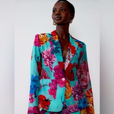 Florals Never Looked So Chic! This Organza Blazer Is So Sophisticated, Ladylike And Absolutely Gorgeous. It’s The Perfect Compliment To Jeans, Dress Or Skirt. The Colors Are Magnificent And The Sheer Fabric Is So Lightweight. Us Size: 12 Sleeve Length: 25” P2p: 18” Shoulder To Hemline: 27” Features: Organza Fabric Large, Bold Floral Print Long Sleeves Padded Shoulders Single Button Closure Front Functional Pockets Tailored Fit Silk Long Sleeve Blazer With Floral Print, Summer Floral Print Blazer For Work, Chic Printed Spring Blazer, Multicolor Printed Blazer For Spring, Summer Multicolor Workwear Blazer, Summer Multicolor Blazer For Workwear, Summer Multicolor Blazer For Work, Blue Floral Print Spring Blazer, Spring Blue Floral Print Blazer