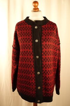 High quality Norwegian wool Cardigan - Sweater. Womens Wool Handmade Traditional Warm Winter Jacket.  The colors are red and black with silver tone pewter buttons. Would make a wonderful Gift for her , Christmas Gift ! Size on label: non Estimated size: women's Medium to XL.  Oversize fit for size medium. Moore fitted for size XL. Condition- excellent vintage looks unused, mint. Pewter button closure. Brand name- Hifa - Garn. Made in Hjelmas Norway. Composition- Pure New Wool. Measurements of th Red Fair Isle Long Sleeve Outerwear, Red Fair Isle Cardigan For Winter, Red Fair Isle Pattern Cardigan For Fall, Red Fair Isle Cardigan For Fall, Red Fair Isle Pattern Winter Cardigan, Red Fair Isle Winter Cardigan, Red Winter Sweater With Buttons, Red Buttoned Sweater For Winter, Red Sweater With Buttons For Winter