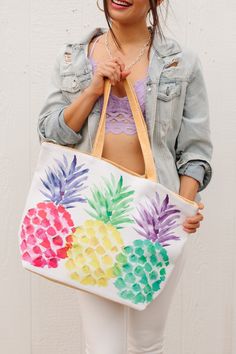 We are color-obsessed for spring and this bag fulfills all of our needs! Three multicolor pineapples make up this bag with a white faux leather front, and linen back and straps. This bag will hold all your essentials and then some! Multicolor Pineapple tote bag 50% linen 50% Pu Length 18" Height 13" Bottom 6" 10" Straps + Interior pocket Tropical Multicolor Shoulder Bag For Everyday Use, Tropical Multicolor Shoulder Bag For Everyday, Multicolor Tropical Shoulder Bag For Everyday Use, Multicolor Tropical Everyday Shoulder Bag, White Canvas Beach Bag For Spring, Spring White Canvas Beach Bag, Tropical Multicolor Bag For Everyday Use, Tropical Multicolor Everyday Bag, Tropical Everyday Bags For Summer