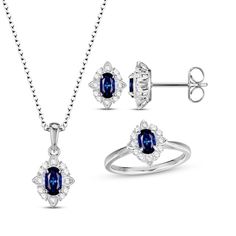 This luxuriant gift set includes a matching necklace, ring and pair of earrings crafted in classic sterling silver. Each piece showcases a vivid oval-cut blue lab-created sapphire enveloped by a scalloped frame of dazzling round white lab-created sapphires. The set is boxed and ready to gift for any occasion. The earrings secure with friction backs and the pendant hangs from an 18-inch cable chain that secures with a lobster clasp. The ring comes available in standard size 7 only. Oval Gemstone Jewelry Sets As Gifts, Oval Fine Jewelry For Formal Occasions, Fine Jewelry Sets In Sapphire Sterling Silver, Sapphire Sterling Silver Fine Jewelry Sets, Sapphire Sterling Silver Jewelry Sets, Classic Diamond Cut Jewelry Sets, Formal Sterling Silver Jewelry Sets With Oval Shape, Formal Oval Jewelry With Halo Setting, Anniversary Oval Fine Jewelry Sets