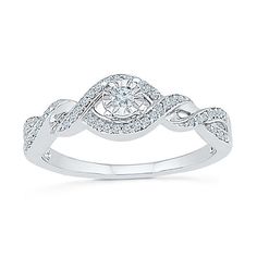 a white gold engagement ring with diamond accents