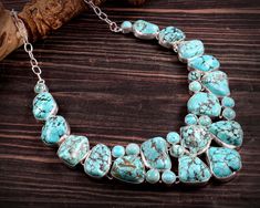 Stone : Rough Turquoise (color enhanced). Please note : As this stone is of unusual shape and color, every stone is different. so, the product you get in hands may slightly vary from the picture shown and not exact same as picture . And this is the beauty of each necklace being different than other. If any query, feel free and contact me. Crafted with the help of trained and experienced artisans team , our products are handmade with quality gemstones. I take care of perfect balance of combinatio Unique Turquoise Necklace With Large Stone, Turquoise Chrysocolla Gemstone Necklace, Unique Turquoise Cabochon Necklace, Unique Turquoise Gemstone Necklace, Turquoise Chrysocolla Stone Necklaces, Distinctive Turquoise Gemstone Necklace, Turquoise Chrysocolla Necklace With Stones, Unique Blue Turquoise Necklace With Natural Stones, Turquoise Chrysocolla Stone Necklace