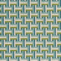 a blue and green woven fabric with small white squares on the top, in an abstract pattern