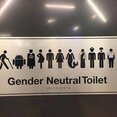 a sign that says gender neutral toilet on the side of a bathroom stall in a public restroom