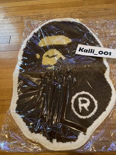 a cake that has been made to look like a gorilla on top of plastic wrap